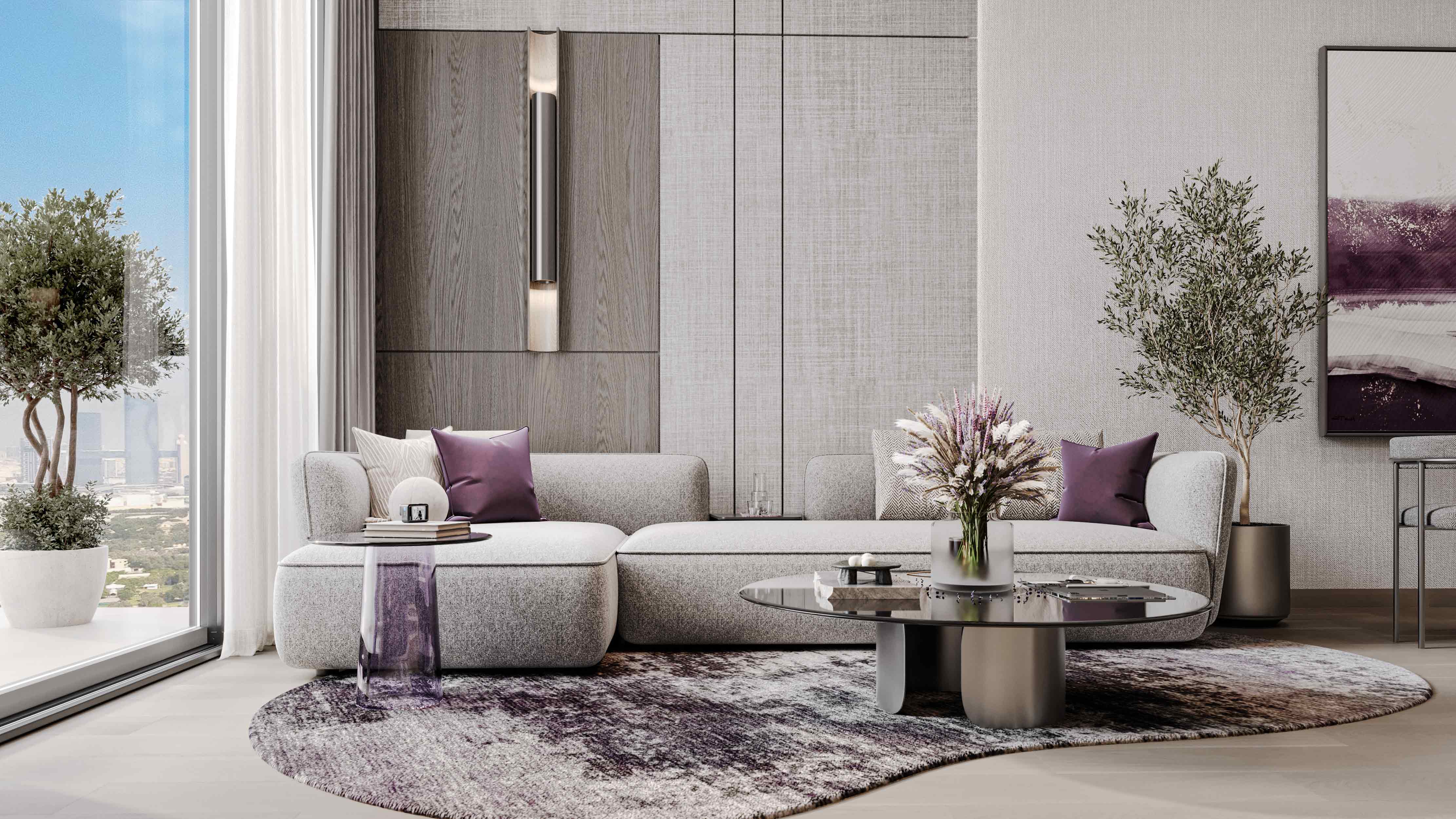 Le Blanc A modern living room featuring a gray sectional sofa, a round coffee table, decorative plants, and large windows.